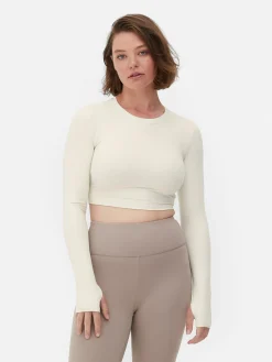 Sale Primark Haut Court De Sport à Manches Longues En Tissu Ultra-doux Rita Ora Ivoire