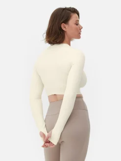 Sale Primark Haut Court De Sport à Manches Longues En Tissu Ultra-doux Rita Ora Ivoire