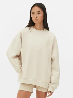 Online Primark Sweat-shirt Graphique Oversize Kappa X Écru