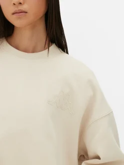 Online Primark Sweat-shirt Graphique Oversize Kappa X Écru